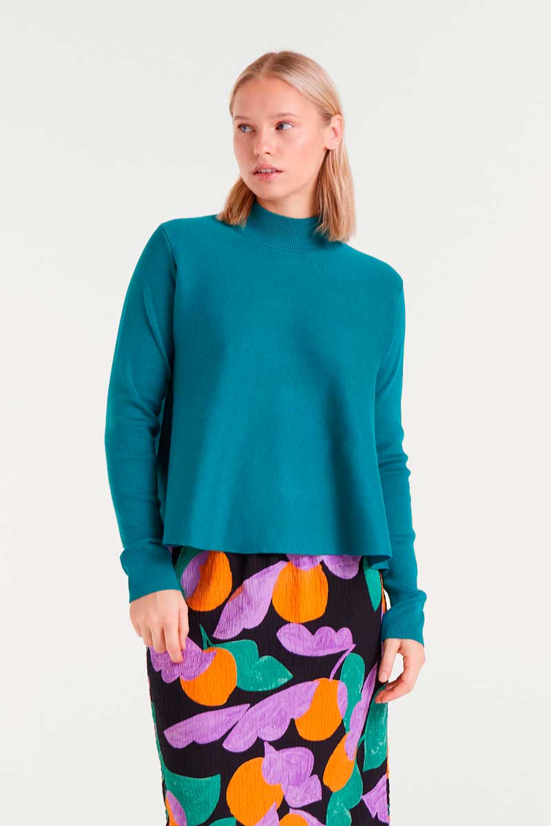 COMPANIA FANTASTICA Turquoise flared turtleneck sweater Τυρκουάζ πλεκτό πουλόβερ με στρογγυλή λαιμόκοψη και μακριά μανίκια. Σιλουέτα σε γραμμή Α. Ριπ λεπτομέρειες. 70% Βισκόζ 30% Βαμβάκι. Το μοντέλο έχει ύψος 175 εκ. και φοράει μέγεθος S. Αποστολή σε όλη την Ελλάδα σε 1-3 ημέρες. Διαθέσιμο και στο φυσικό μας κατάστημα YELLOW BUTTON Χρεμωνίδου & Δαμάρεως 61 Παγκράτι.
