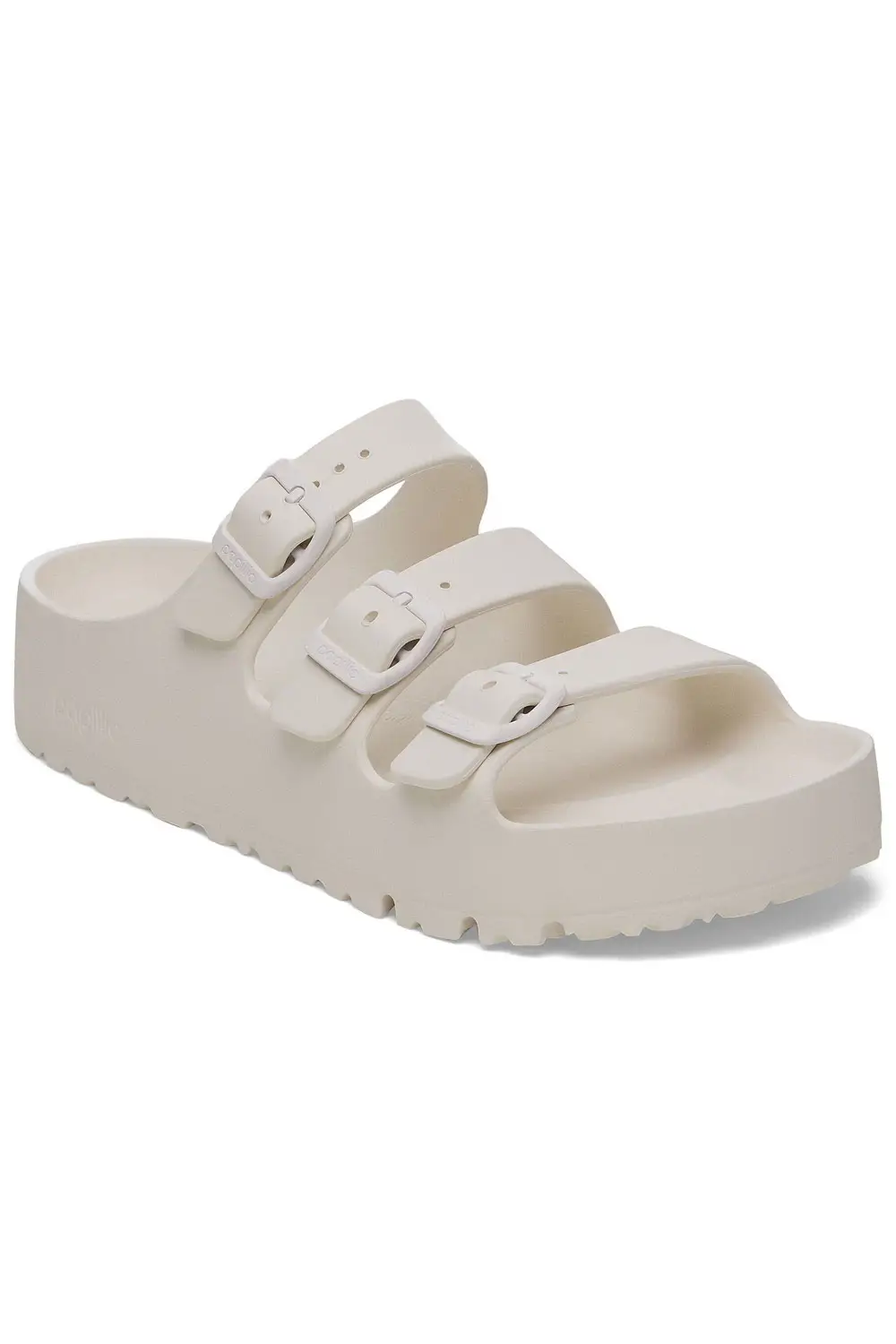 Το BIRKENSTOCK Florida είναι το ιδανικό σανδάλι για όλες τις περιστάσεις και για όποιον στέκεται πολλές ώρες όρθιος. Αυτό το πέδιλο με τρεις ιμάντες προσφέρει καλό κράτημα και μέγιστη άνεση. Η νέα εύκαμπτη εξωτερική σόλα πλατφόρμας έχει ευρύτερο τμήμα τακουνιού για αυξημένη σταθερότητα και ιδανική κατανομή βάρους. Ο νέος σχεδιασμός με οριζόντιες αυλακώσεις στο μπροστινό μέρος βελτιώνει την ευελιξία και την κίνηση. Με πρότυπο το πρωτότυπο από φελλό, αυτό το σανδάλι είναι κατασκευασμένο από ιδιαίτερα ελαφρύ και εξαιρετικά ευέλικτο EVA. Αυτό το συνθετικό υλικό υψηλής ποιότητας, ουδέτερο σε οσμή, το οποίο έχει δοκιμαστεί για επιβλαβείς ουσίες είναι απορροφητικό στους κραδασμούς, ανθεκτικό στο νερό και φιλικό προς το δέρμα. Είναι επομένως ιδανικό για να το φοράτε στην παραλία, στον κήπο ή σε χώρους ευεξίας και σπα. Ανατομικά διαμορφωμένο πέλμα BIRKENSTOCK κατασκευασμένο από EVA Επάνω/φόδρα ποδιού/σόλα: ένα μόνο κομμάτι EVA Λεπτομέρειες: αδιάβροχο, πλενόμενο, εξαιρετικά ελαφρύ Κατασκευάζεται στη Γερμανία Διαθέσιμο και στα φυσικά καταστήματα YELLOW BUTTON Παγκράτι και Ιλίσια.